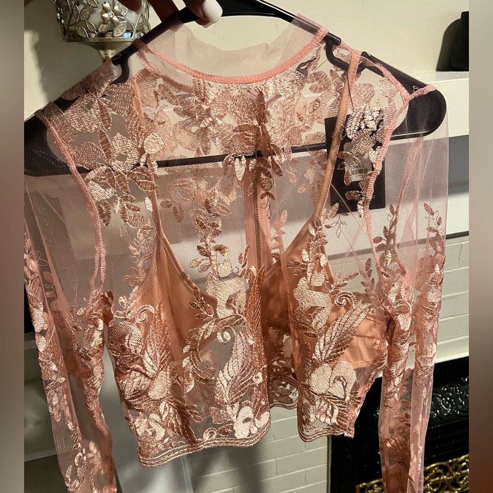 Sheer pink top - size Large . Bralette inside .